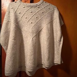 Women’s poncho sweater cap sleeves.  Cream color.